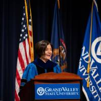 Provost at the podium addressing the audience